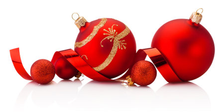 Christmas red decoration baubles and colorful streamers ribbons tape Isolated on a white backgroundの写真素材