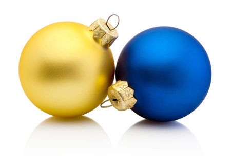 Christmas baubles in Ukrainian colors isolated on a white backgroundの写真素材