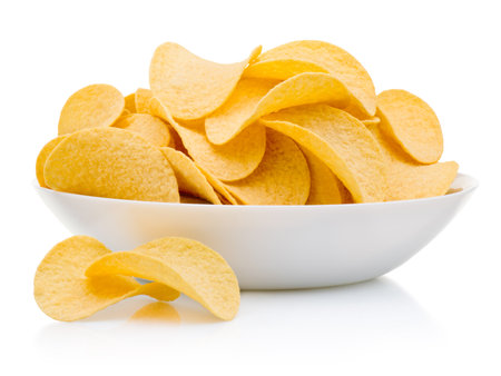 Potato chips in plate isolated on a white backgroundの写真素材