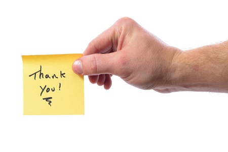 post it note saying thank you isolated on whiteの写真素材