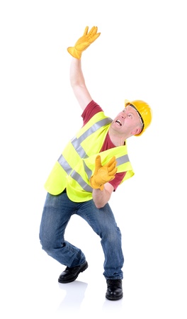 Construction worker involved in a accident isolated on whiteの写真素材