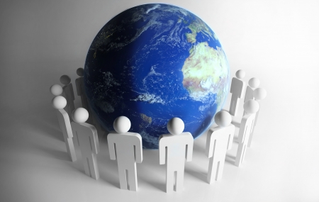 people stood around to globeの写真素材