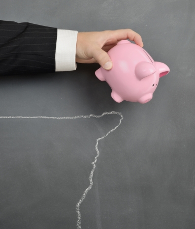 finance dropped off a cliff chalk drawingの写真素材