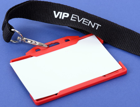 an id badge for a VIP event on a blue background, focuse on the vip text an id badge for a VIP event on a blue background, focuse on the vip text