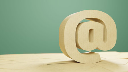 An @ symbol sat on envelopes for a concept of contact us