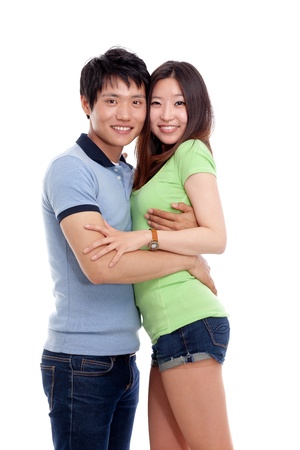 Happy young Asian couple isolated on white background の写真素材