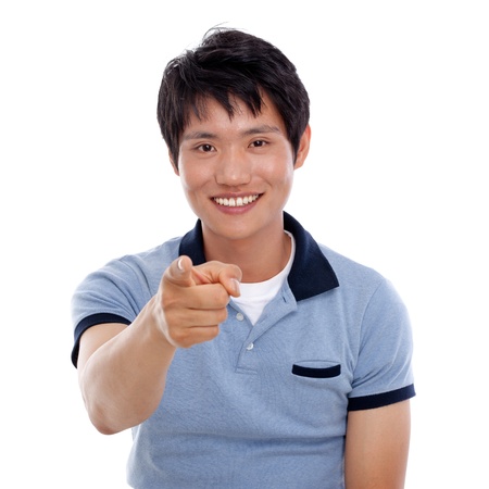 Asian young man indicate something の写真素材