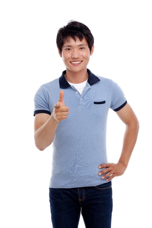 Asian young man indicate something の写真素材