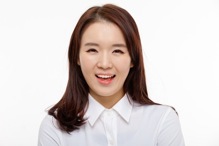 Young Asian pretty business woman close up portrait isolated on white background  の写真素材