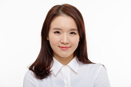 Young Asian pretty business woman close up portrait isolated on white background  の写真素材