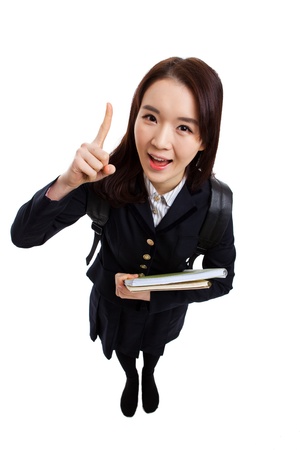 Young Asian student indicate side  high angle shot  isolated on white background の写真素材