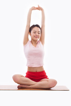 Young Asian woman  exercise yoga isolated on white background. の写真素材