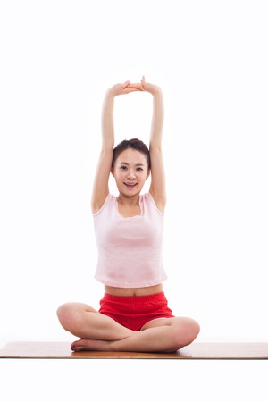 Young Asian woman  exercise yoga isolated on white background. の写真素材