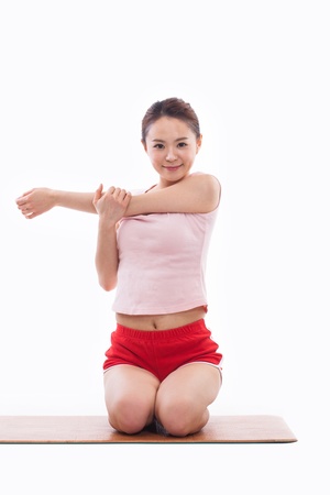 Young Asian woman exercise with dubbbellの写真素材