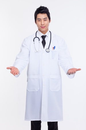 Young Asian doctor isolated on white background  の写真素材