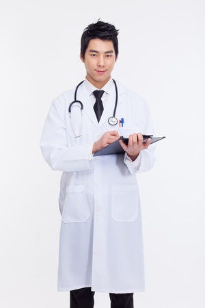 Young Asian doctor isolated on white background. の写真素材
