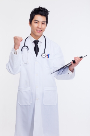 Young Asian showing fist doctor isolated on white background の写真素材