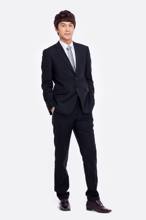 Young Asian business man isolated on white background.の写真素材