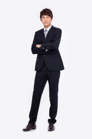 Young Asian business man isolated on white background.の写真素材