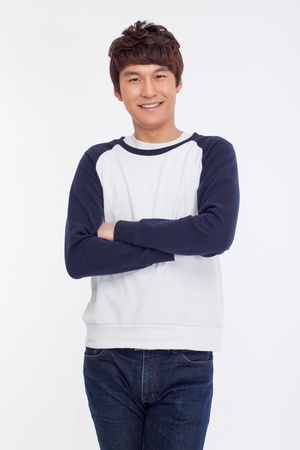 Young Asian man with smiling isolated on white background.の写真素材