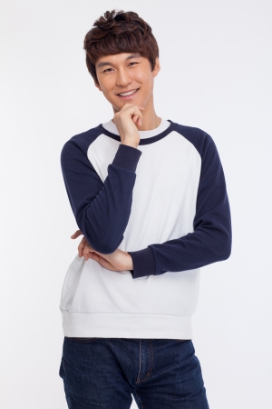 Young Asian man with smiling isolated on white background.の写真素材