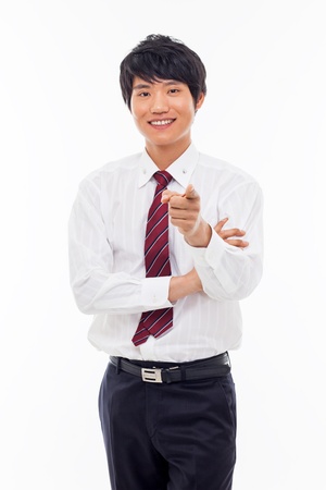 Asian young business indicated you isolated on white background. の写真素材