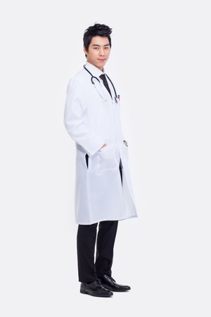 Young Asian doctor isolated on white background. の写真素材