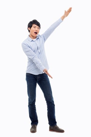 Asian man present something isolated on white background.の写真素材