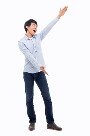 Asian man present something isolated on white background.の写真素材