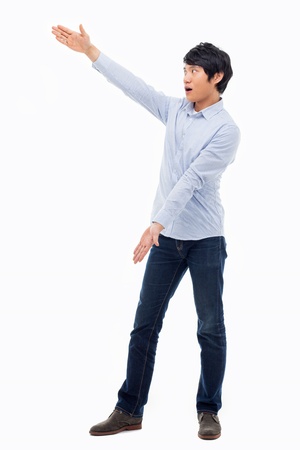 Asian man present something isolated on white background.の写真素材
