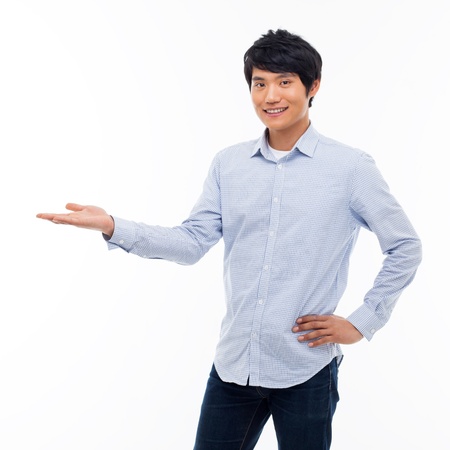 Asian man present something isolated on white background.の写真素材