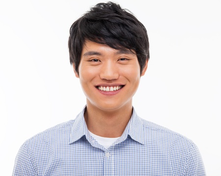 Young Asian man close up shot isolated on white の写真素材