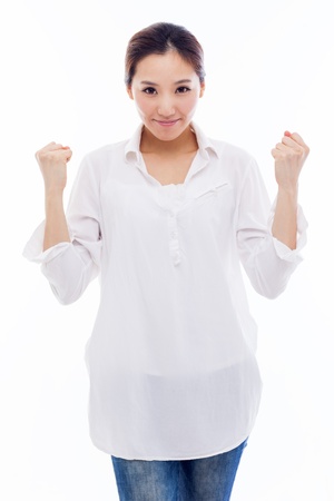 Young Asian woman showing fist isolated on white background.の写真素材