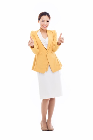 Successful happy Asian businesswoman showing thumb isolated on white background. の写真素材