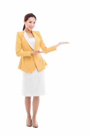 Asian business woman indicate blank space isolated on white background. の写真素材