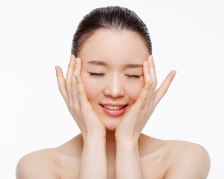 Asian woman beauty shot isolated on white background. の写真素材