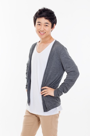 Young Asian man with smiling isolated on white background.の写真素材