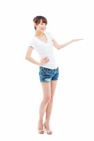 Asian woman present something isolated on white background. の写真素材