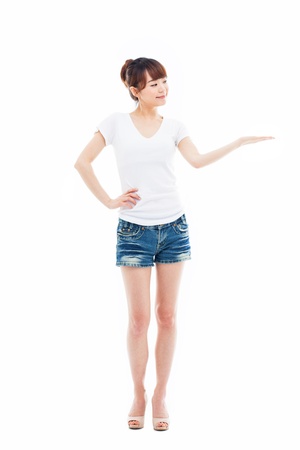 Asian woman present something isolated on white background. の写真素材