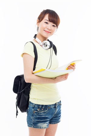 Young Asian student isolated on white background.の写真素材