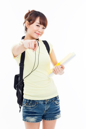 Young Asian woman pointing you isolated on white background. の写真素材
