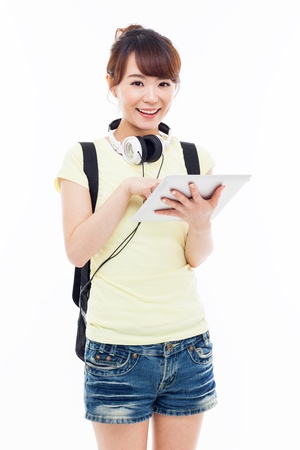 Woman holding tablet computer isolated on white background の写真素材