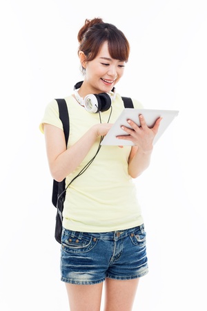 Woman holding tablet computer isolated on white background の写真素材