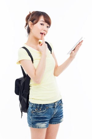 Woman holding tablet computer isolated on white background の写真素材