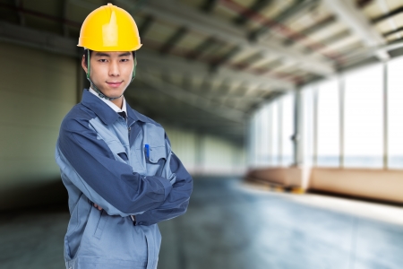 Young Asian engineer isolated on white.の写真素材