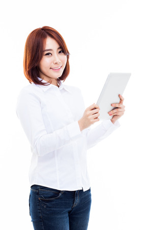 Woman holding tablet computer isolated on white background.の写真素材
