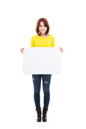 Asian woman showing banner isolated on white background.の写真素材