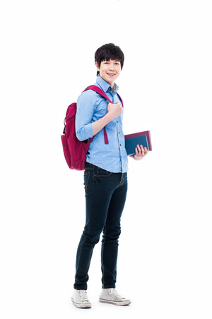 Young Asian student isolated on whiteの写真素材