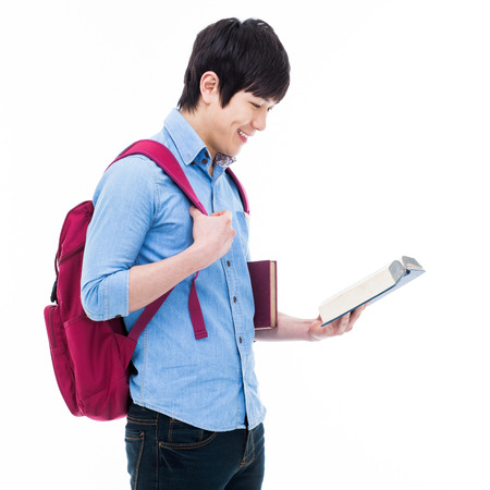 Young Asian student isolated on white の写真素材
