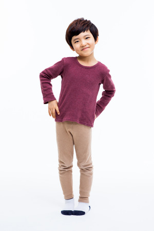 Young happy Asian boy isolated on white background. の写真素材
